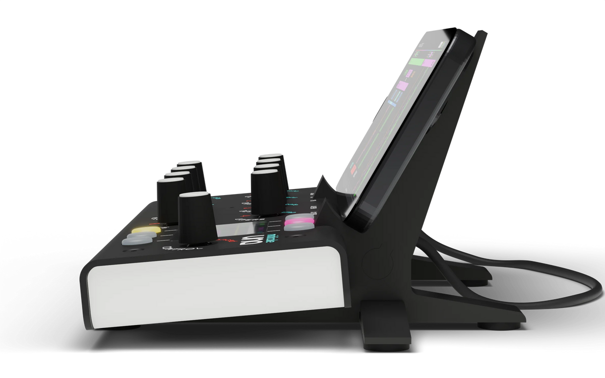 Side profile of Midicake UNA tilted towards the player on the Angle Stand, with a phone held upright behind it